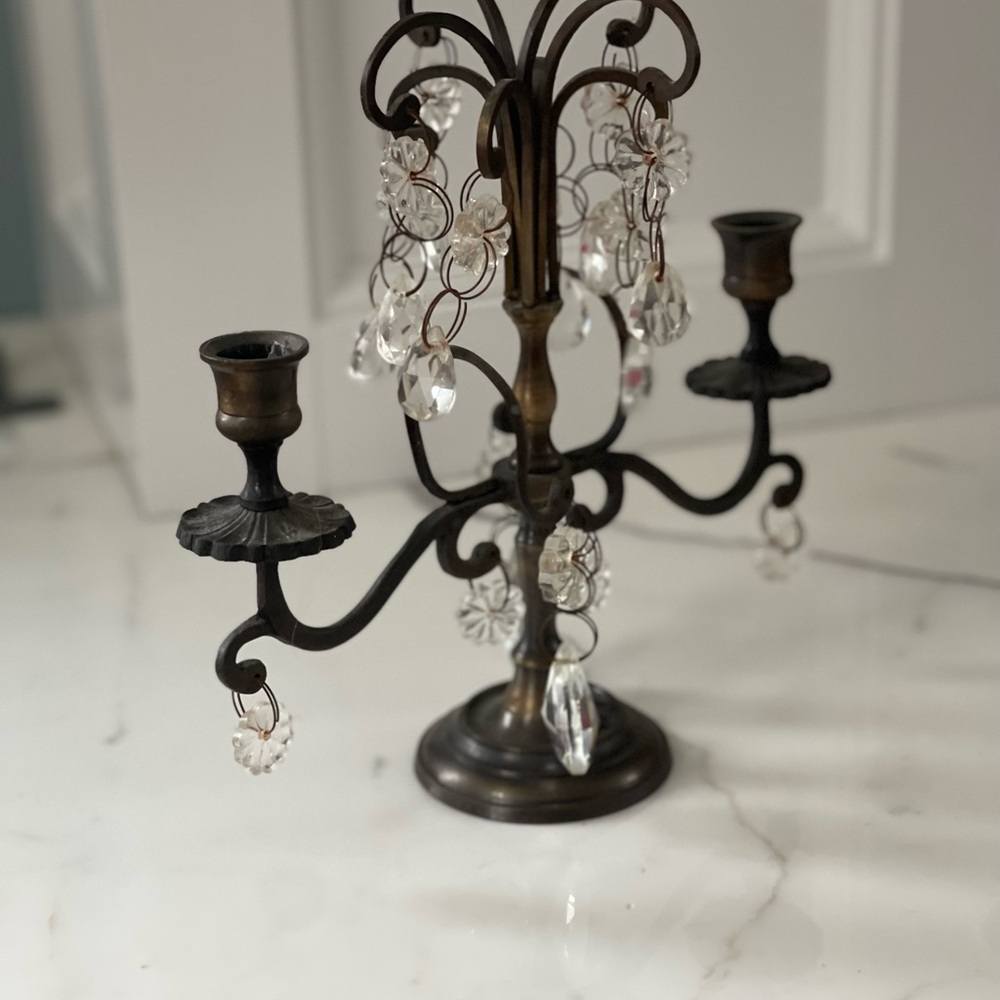 One set of 2 arm crystal candelabra candlesticks.